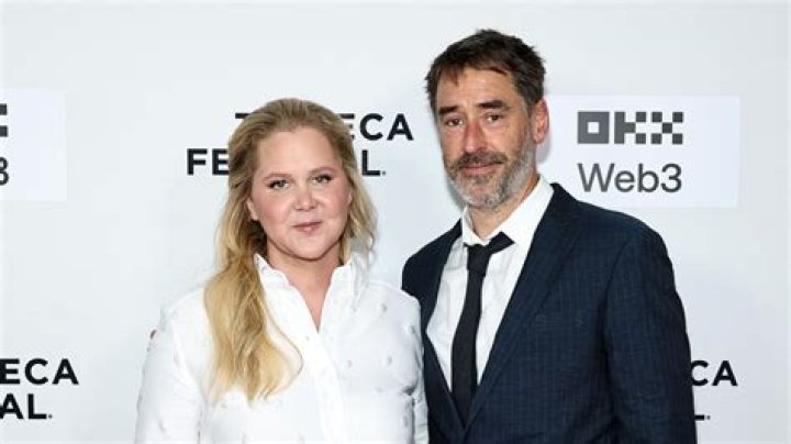 Amy Schumer and Husband Chris Fischer Hilariously Apologizes for Initially Naming Son Gene Attell