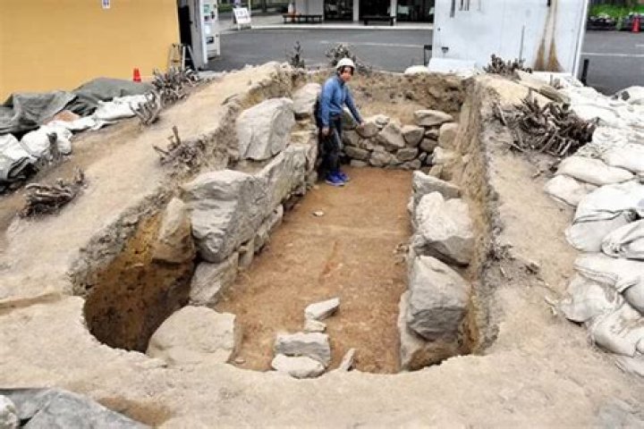 Ancient Tomb Found Under Parking Lot Shrub In Japan