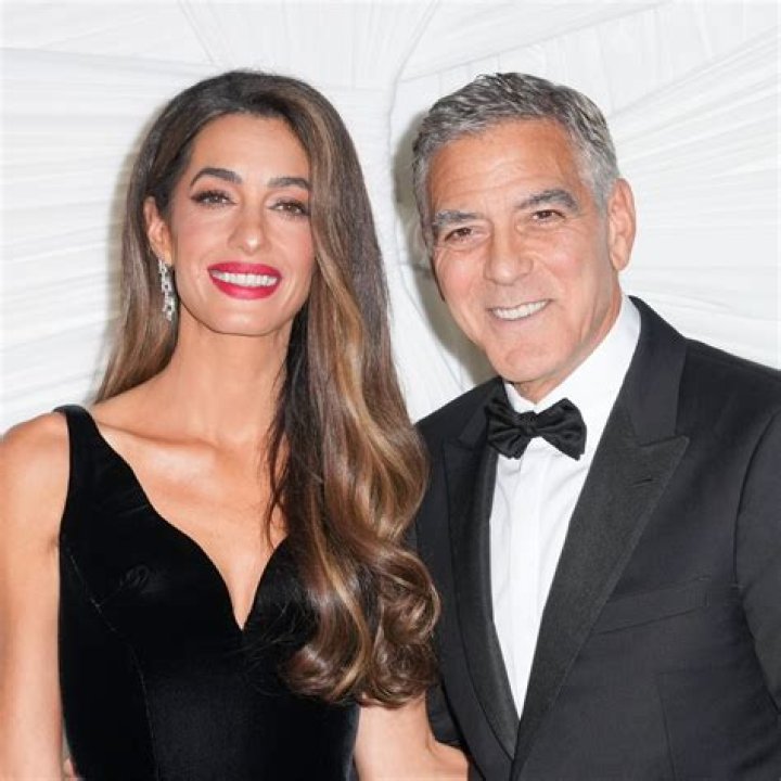 George and Amal Clooney Handed out Headphones to Passengers Sharing a Flight With Their Twins