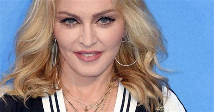 Madonna Goes Topless For Daring Bedroom Photoshoot