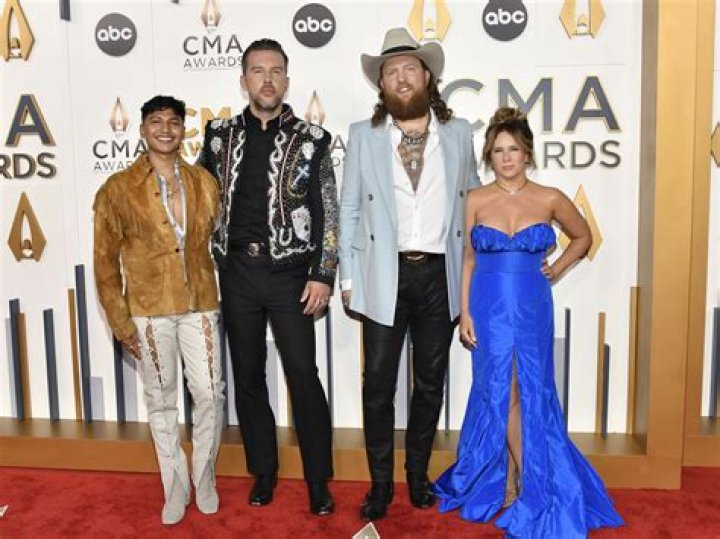 Singer Mickey Guyton Makes a Statement at the 2023 CMA Awards Red Carpet [Photos]