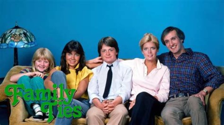 Who sings the theme song for F is for family?